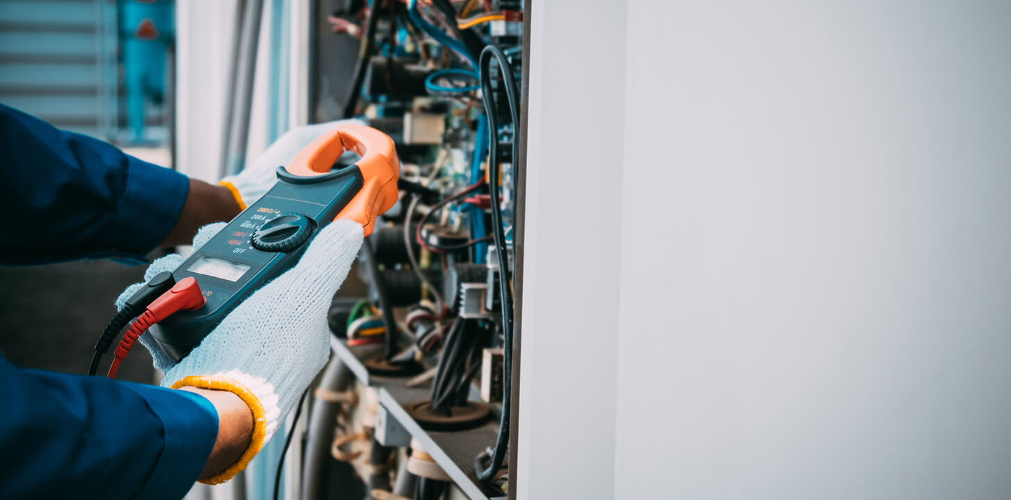 technician checking the ac system